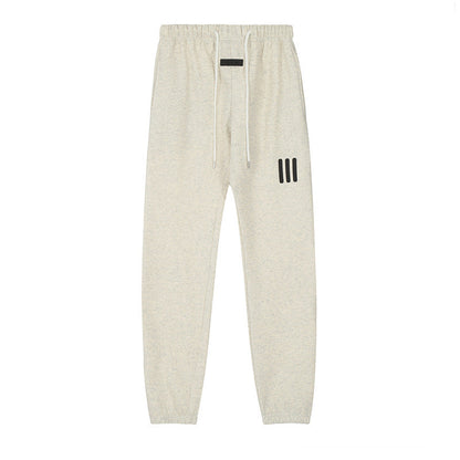 ESSENTIALS Three Stripes Sweatpants