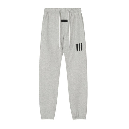 ESSENTIALS Three Stripes Sweatpants
